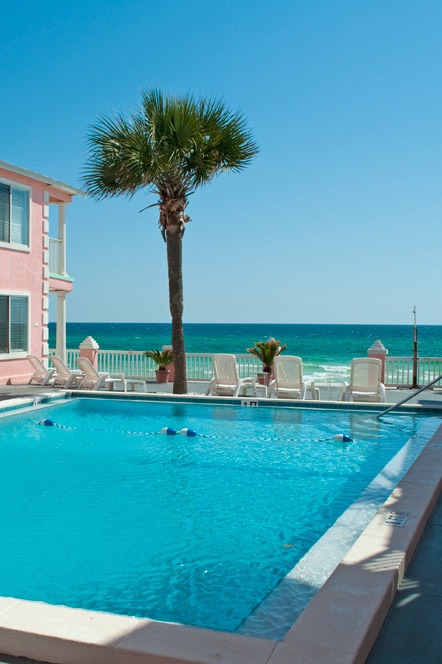 Outdoor swimming pool with Gulf of Mexico in background